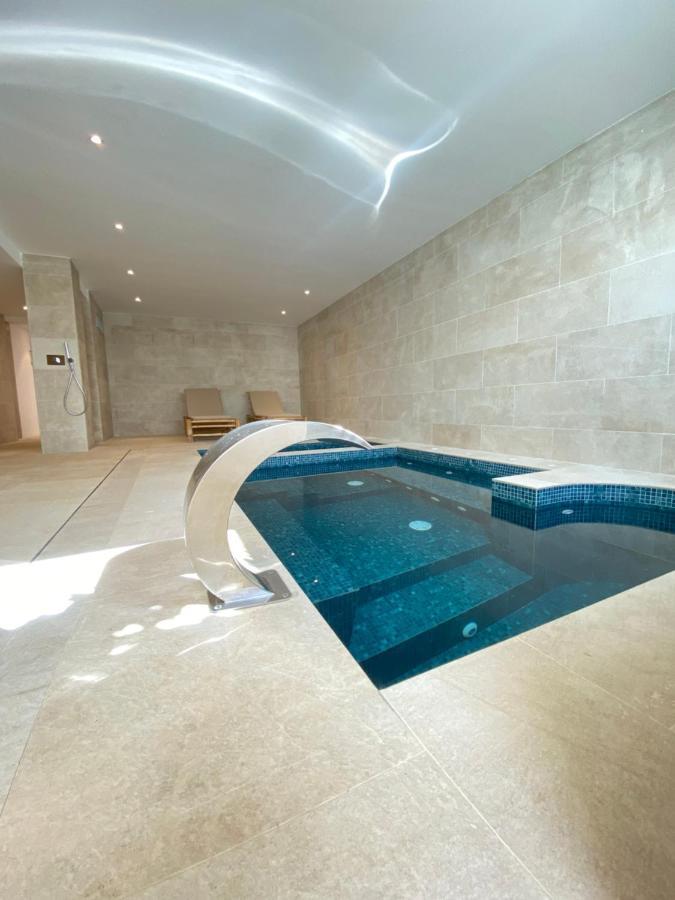 The Olive Boutique Suites & Spa Cala Llonga  Exteriör bild